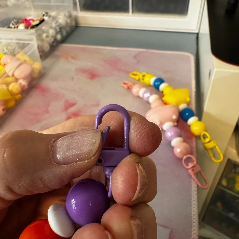 Just ducking around tablet or phone charm holders.